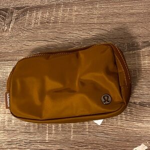 Lululemon brand new belt bag NWT. color burnt caramel.
